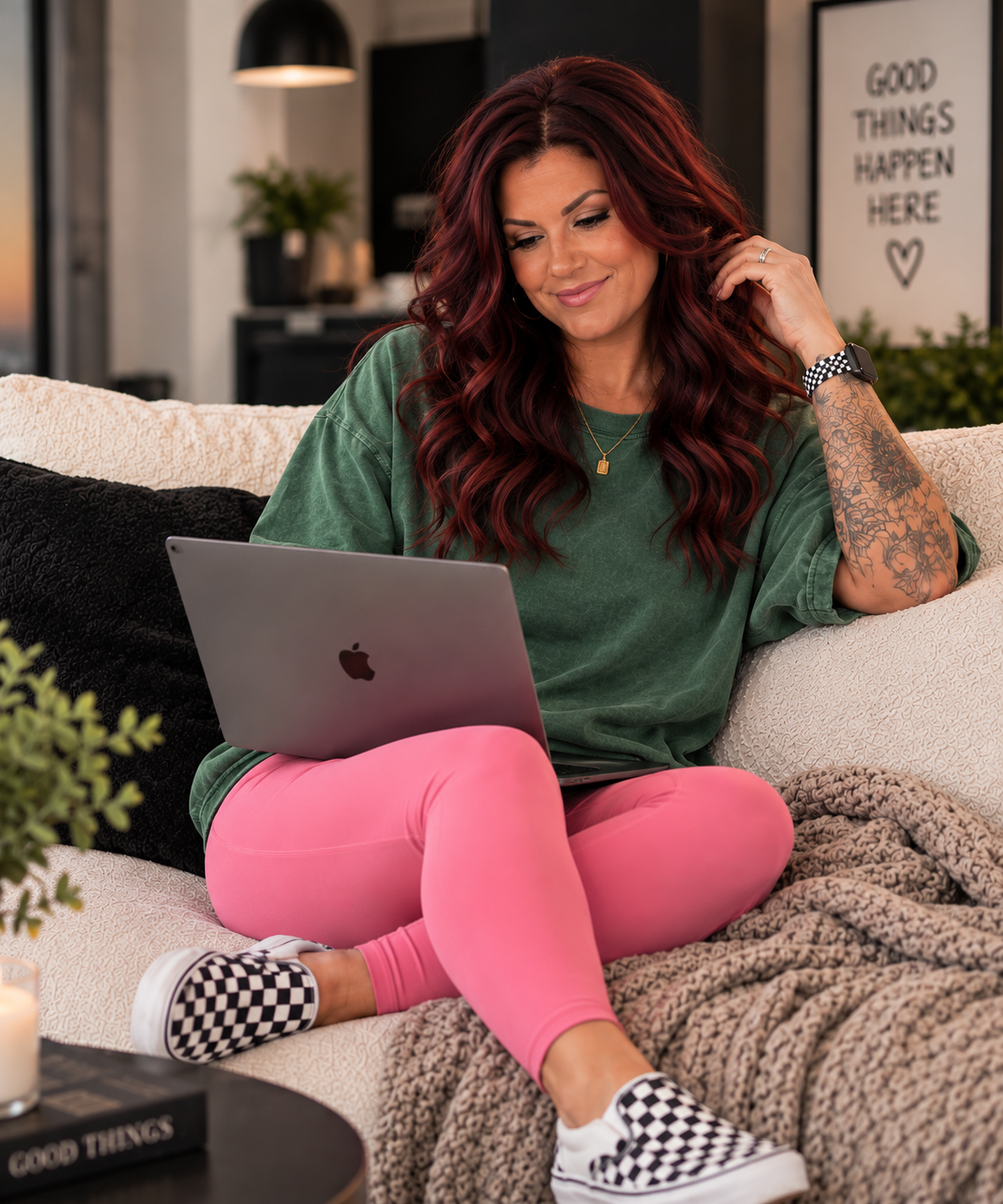 Mallory Martinez working on her laptop at home